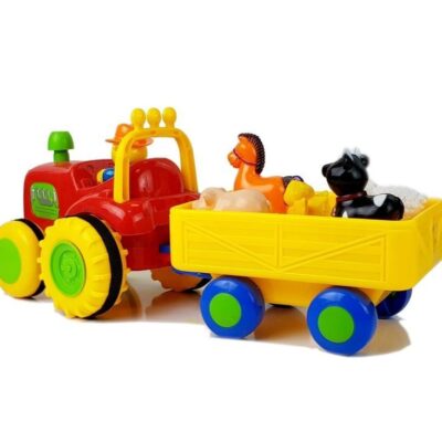 Traktor s prikolicom i životinjama